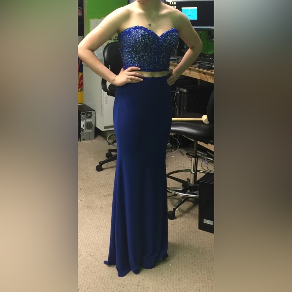 Never worn Royal Blue 2 piece formal prom style dress.  Size 6 - never altered.